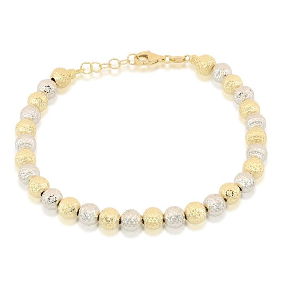 bracciale a palline diamantate in oro giallo e bianco